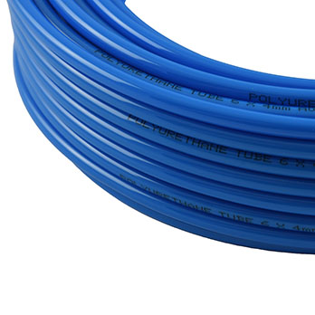 Coiled polyurethane tubing for pneumatic and fluid transfer applications